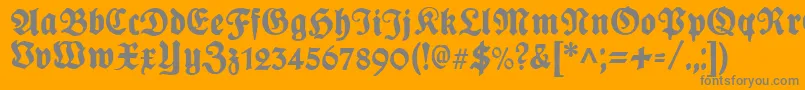 PlakatFrakturunz1l-fontti – harmaat kirjasimet oranssilla taustalla