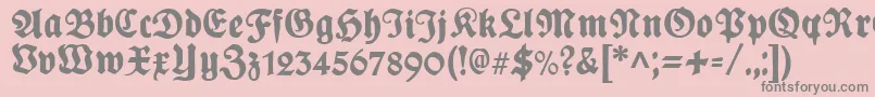 PlakatFrakturunz1l-fontti – harmaat kirjasimet vaaleanpunaisella taustalla