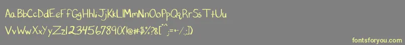 Printcess Font – Yellow Fonts on Gray Background