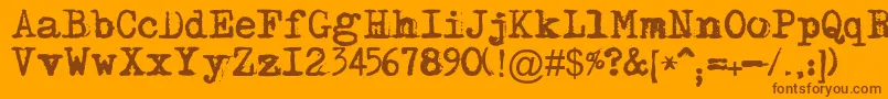 Maszynaplus Font – Brown Fonts on Orange Background