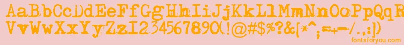 フォントMaszynaplus – オレンジの文字がピンクの背景にあります。