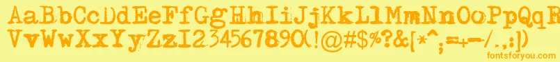 Maszynaplusフォントについての詳細 フォントMaszynaplus – オレンジの文字が黄色の背景にあります。