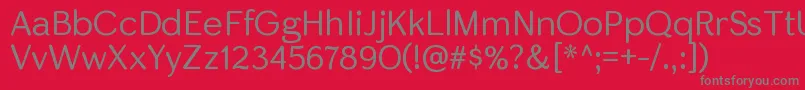 SkirtltRegular-Schriftart – Graue Schriften auf rotem Hintergrund