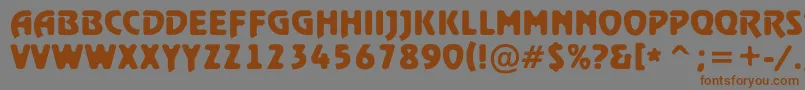 フォントARewindertitulrghBold – 茶色の文字が灰色の背景にあります。