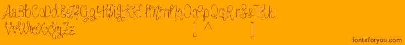 Шрифт MrfFreckledlemonadeDemo – коричневые шрифты на оранжевом фоне