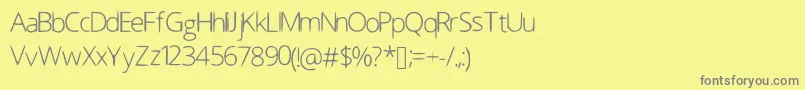 フォントScrunch – 黄色の背景に灰色の文字