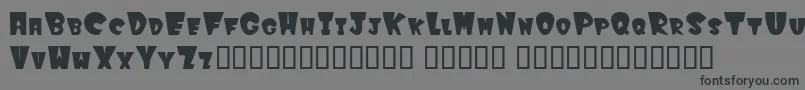 Winkfilled-fontti – mustat fontit harmaalla taustalla