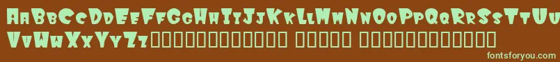 Winkfilled-fontti – vihreät fontit ruskealla taustalla