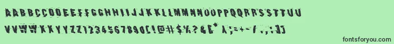 Earthshakeleft Font – Black Fonts on Green Background