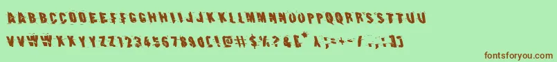 Earthshakeleft Font – Brown Fonts on Green Background