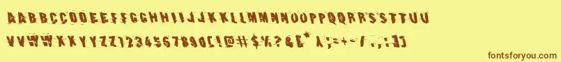 Earthshakeleft Font – Brown Fonts on Yellow Background