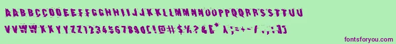 Earthshakeleft Font – Purple Fonts on Green Background
