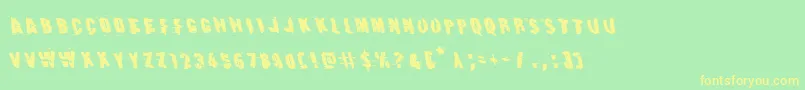 Earthshakeleft Font – Yellow Fonts on Green Background