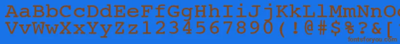 フォントNtcouriervkNormal110n – 茶色の文字が青い背景にあります。