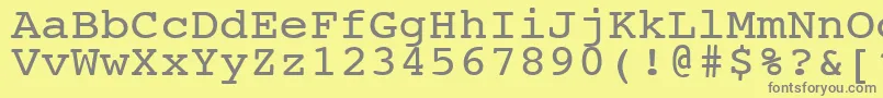 フォントNtcouriervkNormal110n – 黄色の背景に灰色の文字