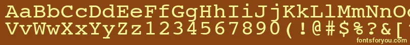 NtcouriervkNormal110n-fontti – keltaiset fontit ruskealla taustalla