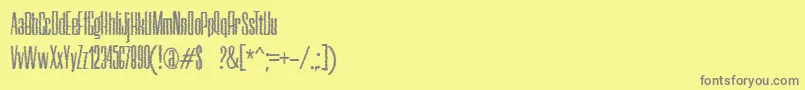 Fonte NerettaTrash – fontes cinzas em um fundo amarelo