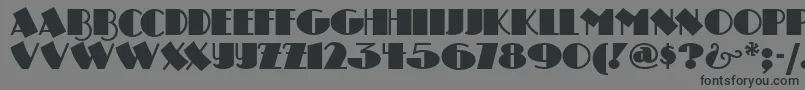 フォントDrumagstudionf – 黒い文字の灰色の背景