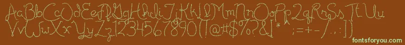 フォントPublicitebasic – 緑色の文字が茶色の背景にあります。