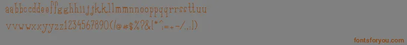 Шрифт SaditekinscriptRegular – коричневые шрифты на сером фоне