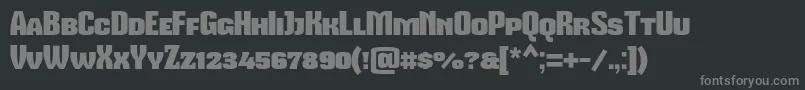 フォントMikodacspcs – 黒い背景に灰色の文字