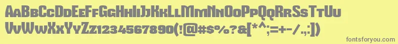Mikodacspcs-Schriftart – Graue Schriften auf gelbem Hintergrund