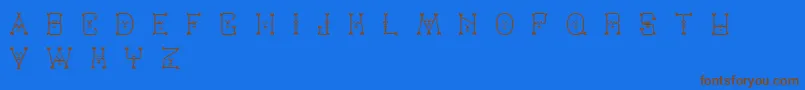 フォントVarmint – 茶色の文字が青い背景にあります。