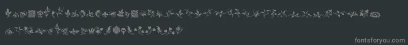 RoughFleuronsFree-Schriftart – Graue Schriften auf schwarzem Hintergrund