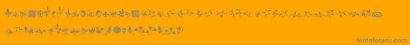 RoughFleuronsFree-Schriftart – Graue Schriften auf orangefarbenem Hintergrund