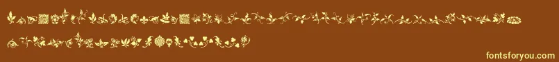 Czcionka RoughFleuronsFree – żółte czcionki na brązowym tle