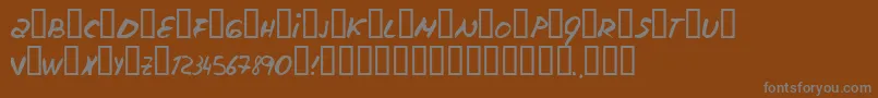 Escudillers-fontti – harmaat kirjasimet ruskealla taustalla