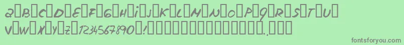 フォントEscudillers – 緑の背景に灰色の文字