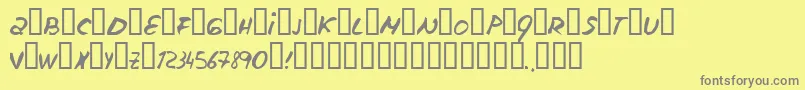 Escudillers-fontti – harmaat kirjasimet keltaisella taustalla