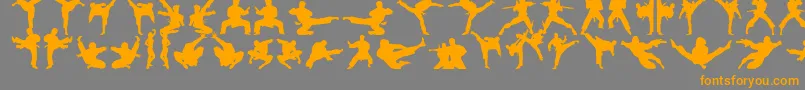 Karatechop-Schriftart – Orangefarbene Schriften auf grauem Hintergrund