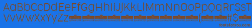 CocogooseNarrowUltralightTrial Font – Brown Fonts on Blue Background