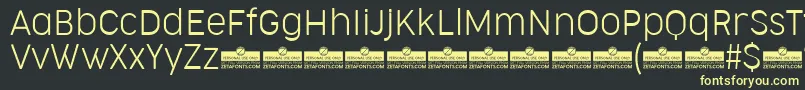 CocogooseNarrowUltralightTrial Font – Yellow Fonts on Black Background