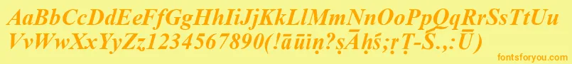 SanskritRomanBoldItalic-fontti – oranssit fontit keltaisella taustalla