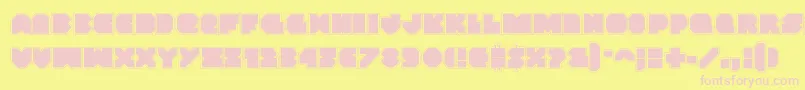 Vxrocketacad-Schriftart – Rosa Schriften auf gelbem Hintergrund