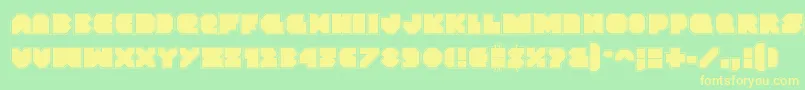 フォントVxrocketacad – 黄色の文字が緑の背景にあります