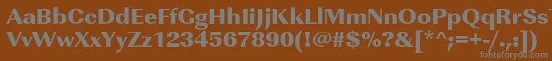 Urwimperialtultbolwid-Schriftart – Graue Schriften auf braunem Hintergrund