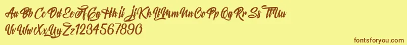 MysteriousLovers Font – Brown Fonts on Yellow Background