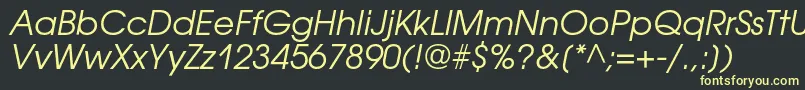 AvantgardegothiccOblique Font – Yellow Fonts on Black Background
