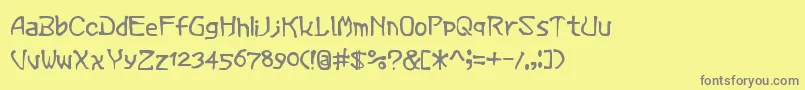 フォントVerminMagic – 黄色の背景に灰色の文字