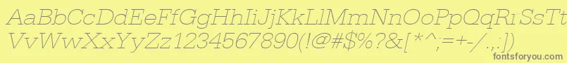 UrwegyptiennetextligextwidOblique Font – Gray Fonts on Yellow Background