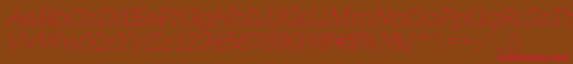 UrwegyptiennetextligextwidOblique Font – Red Fonts on Brown Background