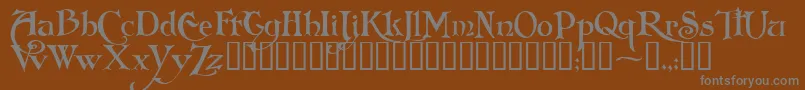 FolkardTM Font – Gray Fonts on Brown Background