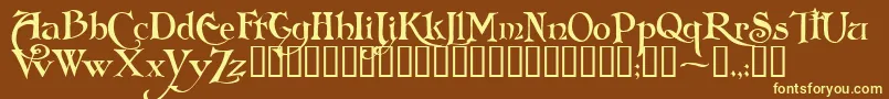 FolkardTM-fontti – keltaiset fontit ruskealla taustalla