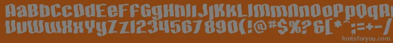 SfHallucination-Schriftart – Graue Schriften auf braunem Hintergrund