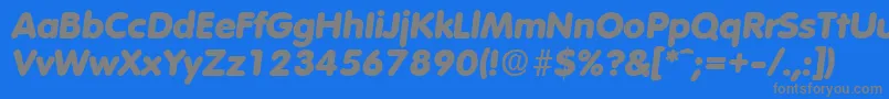 フォントVolkswagenExtraboldita – 青い背景に灰色の文字