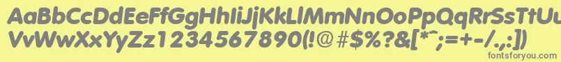 フォントVolkswagenExtraboldita – 黄色の背景に灰色の文字